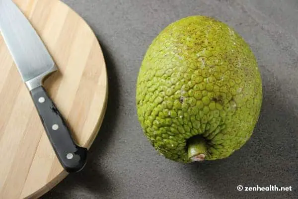 Breadfruit unpeeled with knife