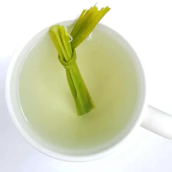 Lemongrass tea with stalk in teacup