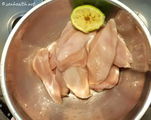Raw chicken washed with lemon