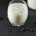 Soursop juice in glass with seeds